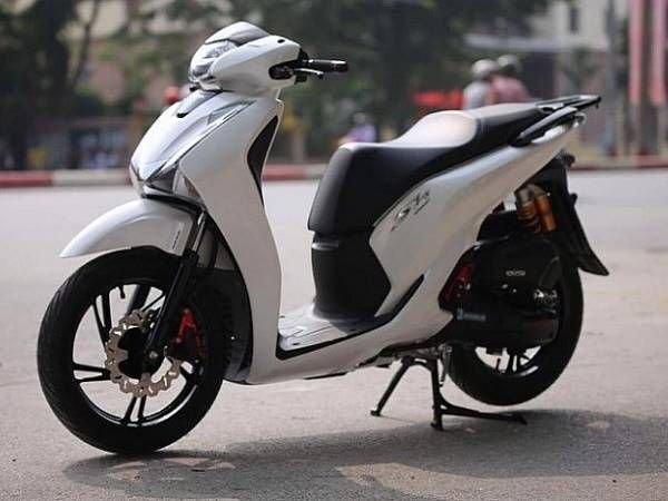 Mơ thấy xe máy màu đỏ, đen hoặc trắng